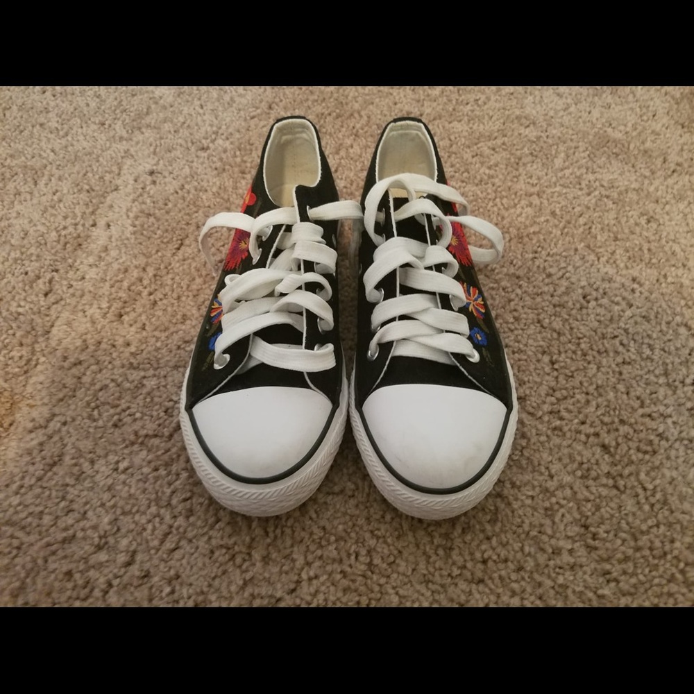 Black and white sneakers with floral design